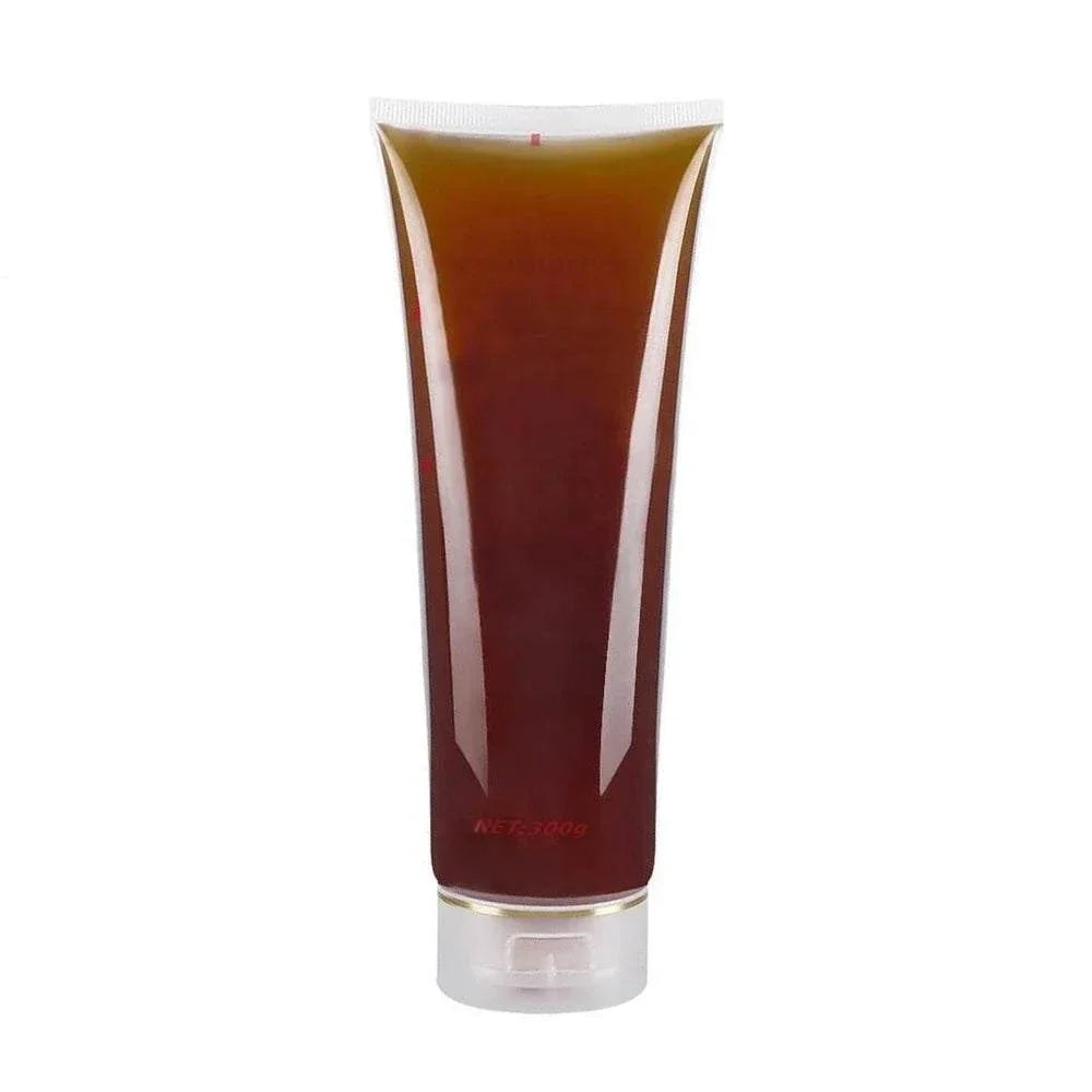 Ultrasonic RF Gel in a translucent tube, showing dark amber-brown gel and a white flip-top cap